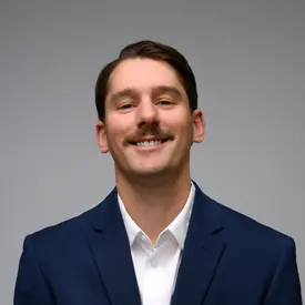 Portrait of Benjamin Misanovic, Realtor